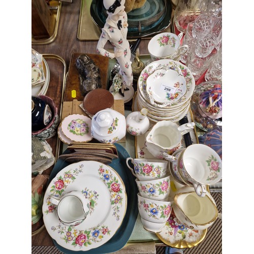 298 - Assortment of decorative items, Royal Stafford tea set, bronzed dog on book, vintage compacts, etc