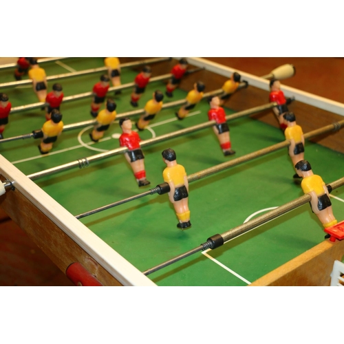 108 - 1970's folding table football game, previously featured in 'T2 Trainspotting' props sale.