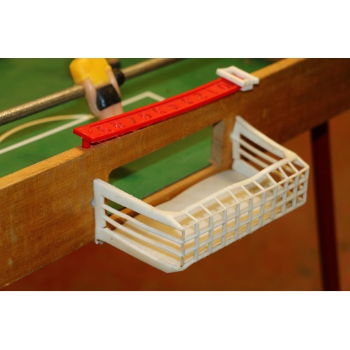 108 - 1970's folding table football game, previously featured in 'T2 Trainspotting' props sale.