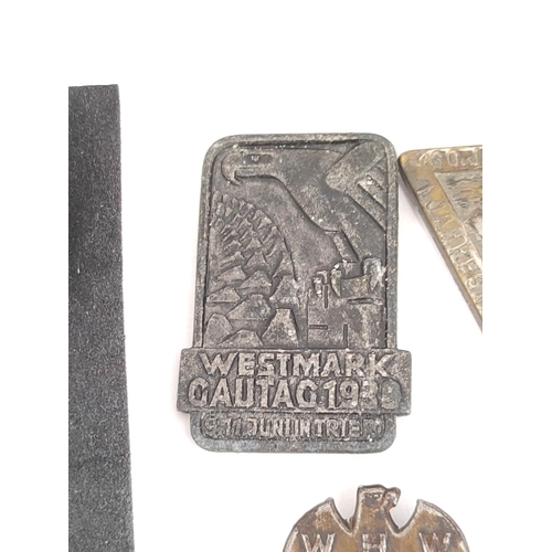 201 - German Third Reich. Collection of NSDAP badges to include a Westmark Gautag 1939 