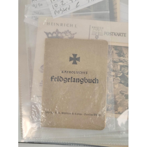 202 - German Third Reich. Folder of ephemera to include a Katholisches Feldgefangbuch (catholic field hymn... 