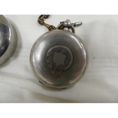 206 - Silver pocket watch and brass guard chain.