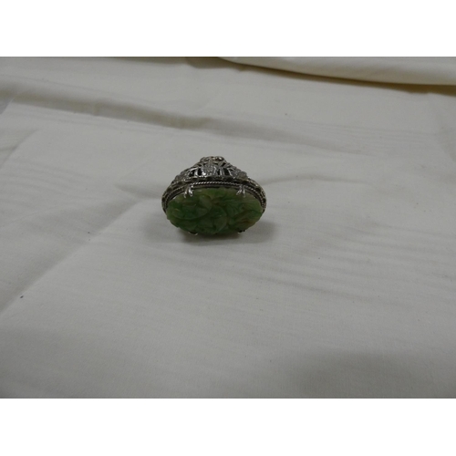 219 - Large Chinese jade and silver ring.