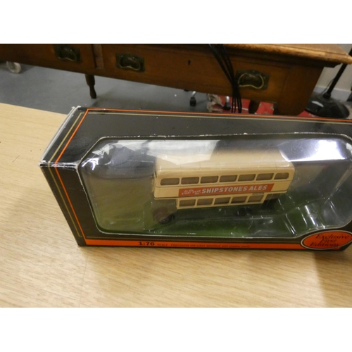 228 - Exclusive first editions 1.76 scale die cast buses.