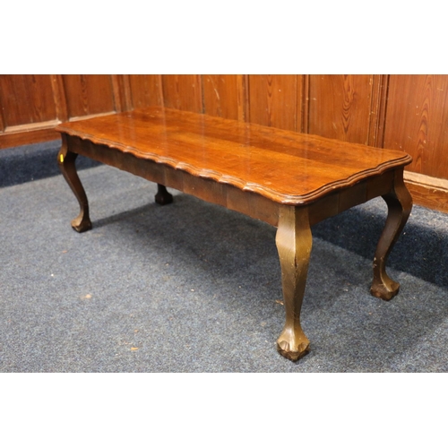 768 - Mahogany coffee table having pie crust edge, raised on cabriole supports terminating in ball and cla... 