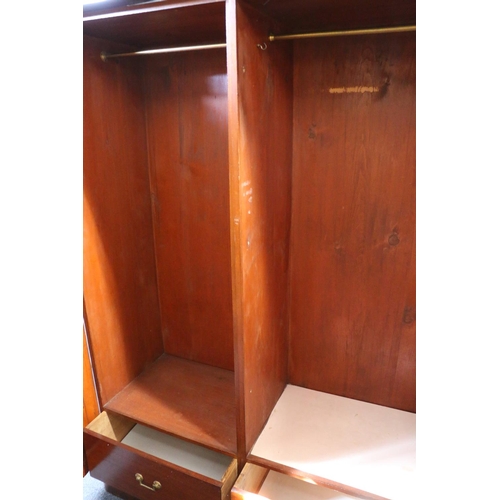 773 - Victorian mahogany two door wardrobe, with two interior base drawers, raised on plinth base, 207cm h... 