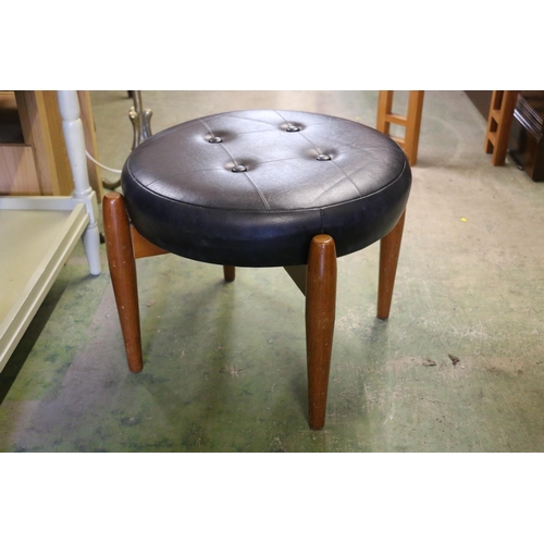 859 - Circular stool on teak tapering supports, 38 x 58cm.