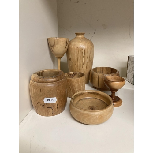 250 - Turned treen to include a vase, a goblet, bowls, jars, etc.