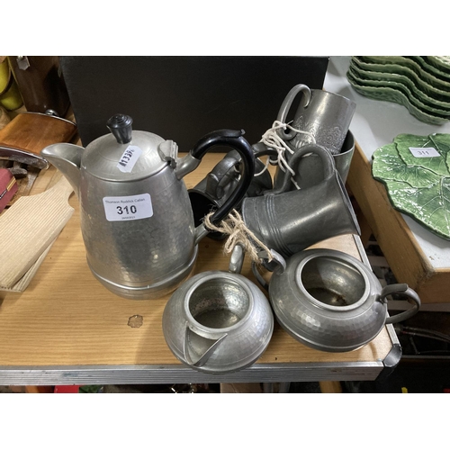 310 - Hall Brothers pewter coffee service, 20cm and four tankards.