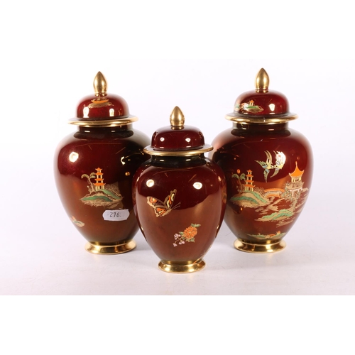 21 - Three Carlton ware lidded jars, one marked Rouge Royale to base, 19cm.