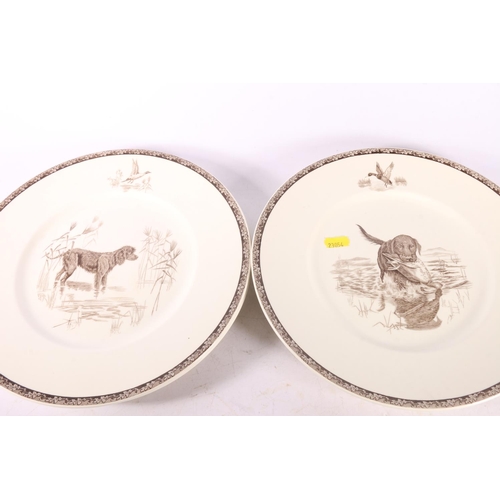 22 - Five Wedgwood plates depicting hunting dogs, 27cm diameter, and another of an elephant in Kruger Nat... 