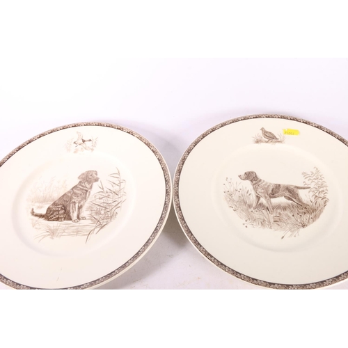 22 - Five Wedgwood plates depicting hunting dogs, 27cm diameter, and another of an elephant in Kruger Nat... 