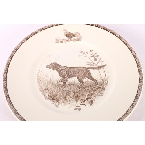 22 - Five Wedgwood plates depicting hunting dogs, 27cm diameter, and another of an elephant in Kruger Nat... 