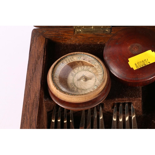 9 - Oak cutlery canteen with set of six fish knives and forks, and a compass. 