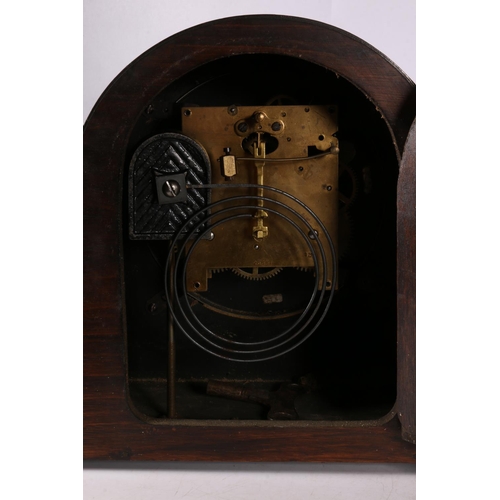 51 - Oak tambour mantle clock, dial inscribed Henderson's, 23cm, and a microscope in original box. 