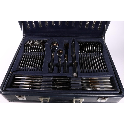 54 - Suissine cutlery in traveling case style canteen.