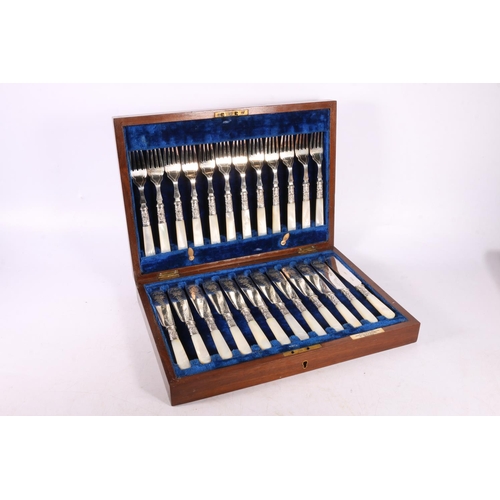 59 - Cutlery canteen with set of twelve fish knives and forks having mother of pearl handles, and another... 