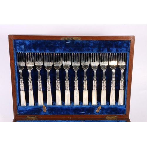 59 - Cutlery canteen with set of twelve fish knives and forks having mother of pearl handles, and another... 