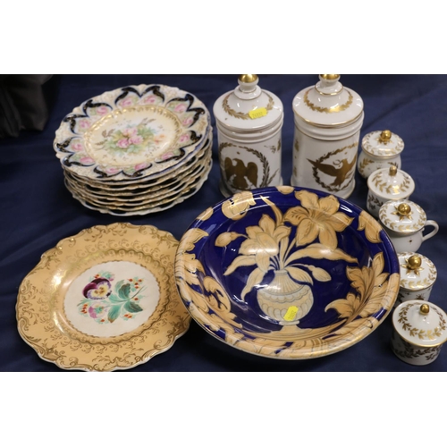 63 - Footed bowl with floral and gilt decoration, 25cm diameter, assorted plates, lidded jars, etc. 