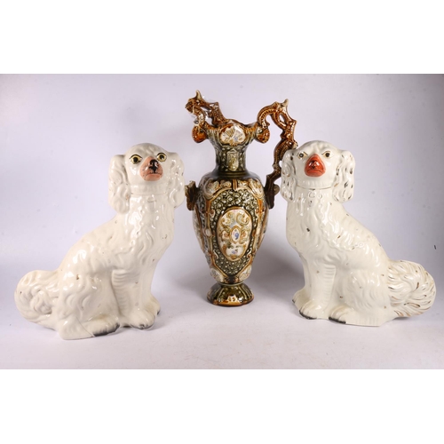 64 - Near pair of Staffordshire spaniels, 30cm and a tin glazed vase marked Alhambrian to base.