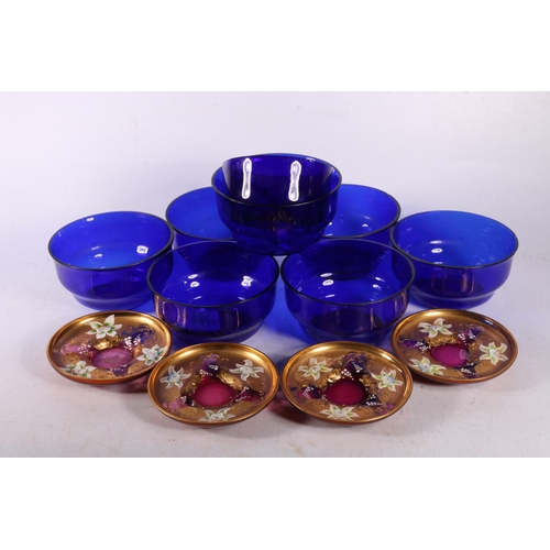 67 - Seven blue glass finger bowls, 12cm diameter, and four Bohemian glass saucers.