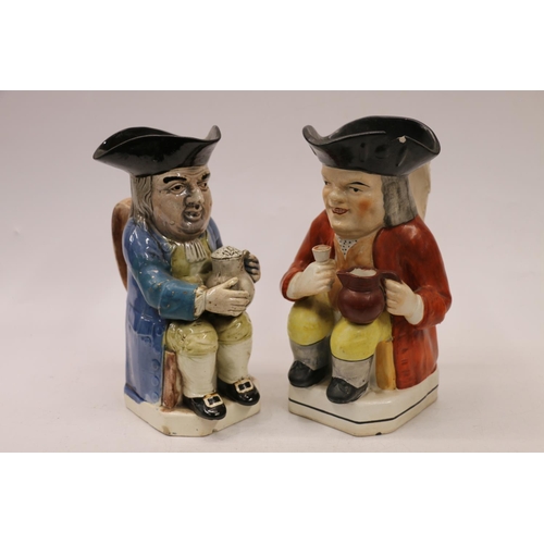 77 - Two toby jugs, 25cm.