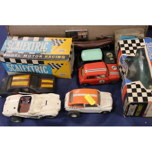 103 - Case containing vintage Scalextric, some boxed, etc.