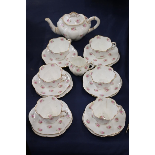 111 - Six Foley china cups, saucers, plates, a milk jug and a teapot, 11cm.