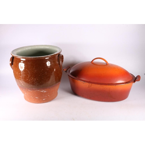 99 - Part glazed stoneware pot, 27cm, also a metal cooking dish marked Holland.