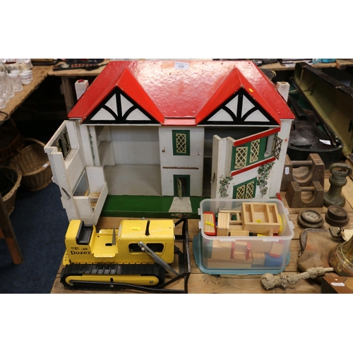 346 - G B Toys dolls house, wooden furniture, and a vintage Tonka bulldozer.