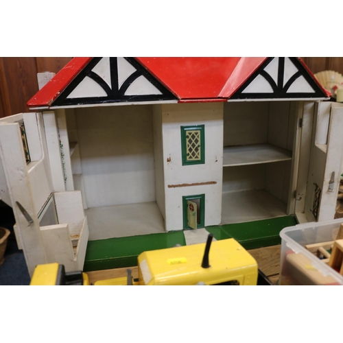 346 - G B Toys dolls house, wooden furniture, and a vintage Tonka bulldozer.