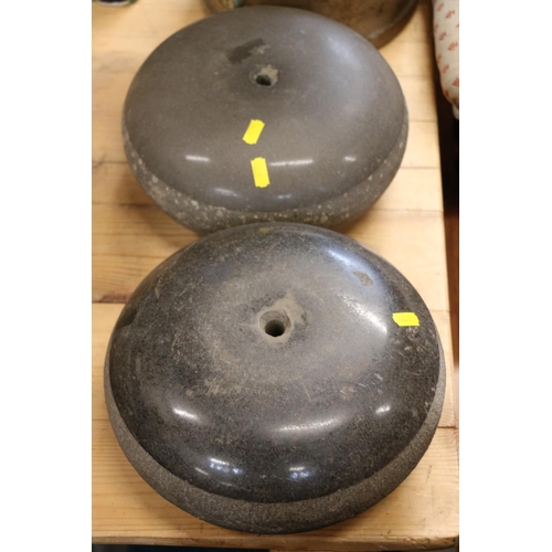 326 - Pair of granite curling stones lacking handles.