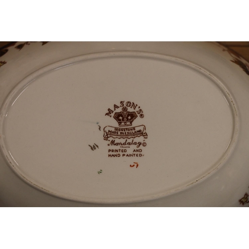 334 - Comprehensive Masons Mandalay dinner ware to include a coffee pot, jugs, cups and saucers, dinner pl... 