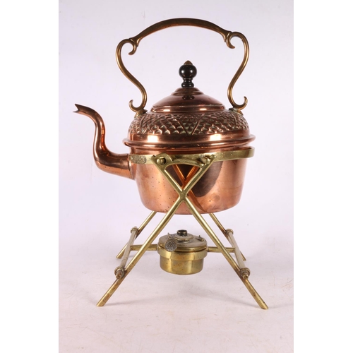 131 - Copper kettle on stand with plaque inscribed Soutter's, 33cm. 