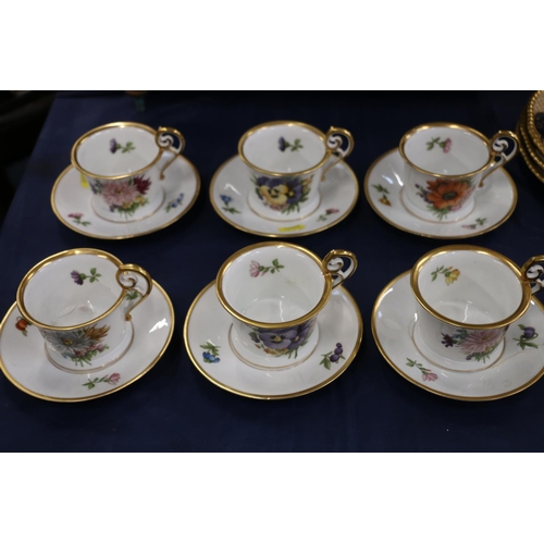 134 - Rosenthal teacups and saucers with gilt floral decoration, 8cm. 