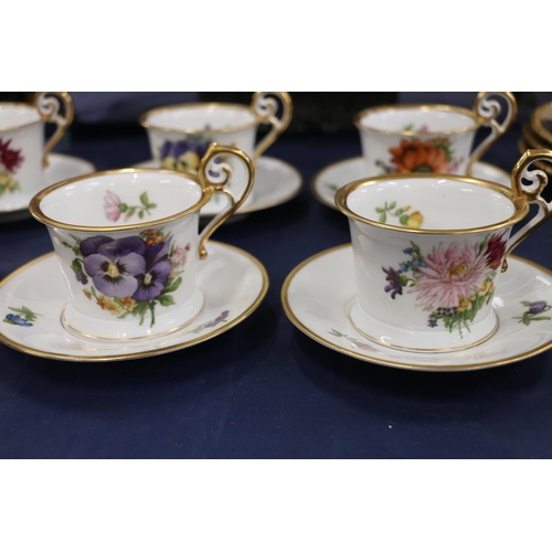 134 - Rosenthal teacups and saucers with gilt floral decoration, 8cm. 