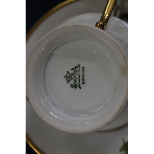 134 - Rosenthal teacups and saucers with gilt floral decoration, 8cm. 