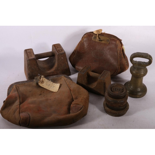 343 - National Commercial Bank leather sack, another, and cast metal weights.