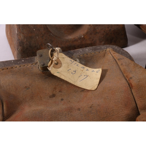 343 - National Commercial Bank leather sack, another, and cast metal weights.