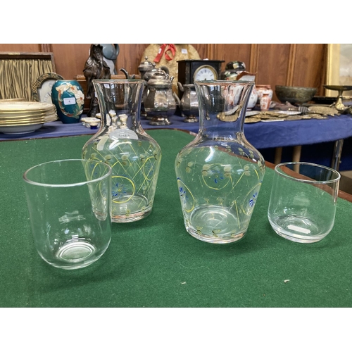 165 - Pair of painted carafes, 16cm, with whisky glasses.