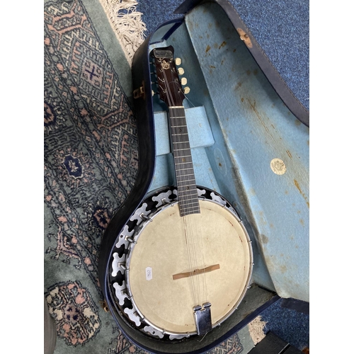 215 - Banjolele with Melody Major label in case.