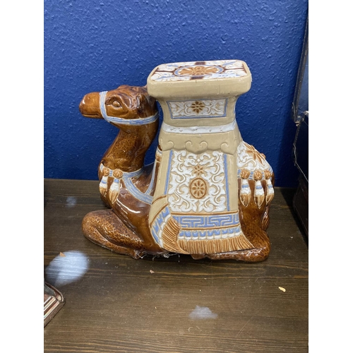 222 - Glazed pottery camel plant stand 39cm. 