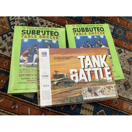 325A - Two Subbuteo games, and Tank Battle, boxed.