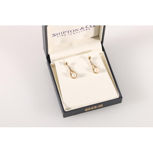 538 - Pair of 9ct gold earrings set with pearls, 1.9g gross in Shipton & Co Fine Jewellery box.