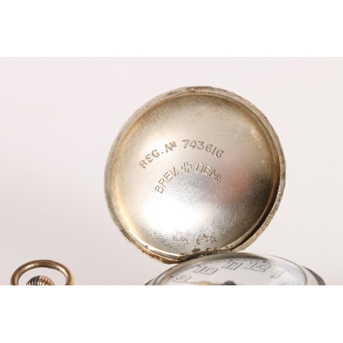 593 - Military style pocket watch in golf ball shaped case and a 935 grade Continental silver fob watch (a... 