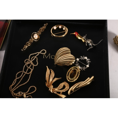 596 - Victorian style garnet style necklace, kangaroo brooch, faux pearls, and other costume jewellery.