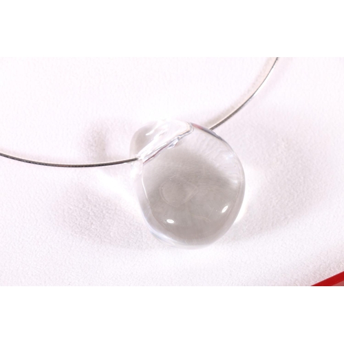 604 - Baccarat pebble pendant on silver chain, 35cm. 