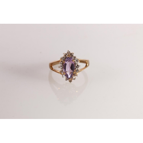 608 - 9ct gold dress ring with marquise cut amethyst surrounded by clear stones, size Q, 3.6g. 