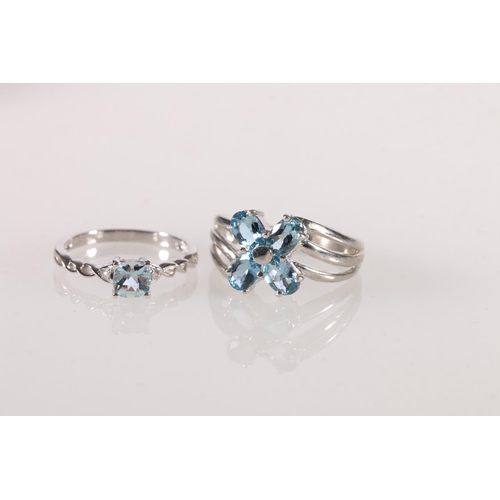 613 - 9ct white gold aquamarine set ring, size Q, and another with a single stone. 5.9g gross.