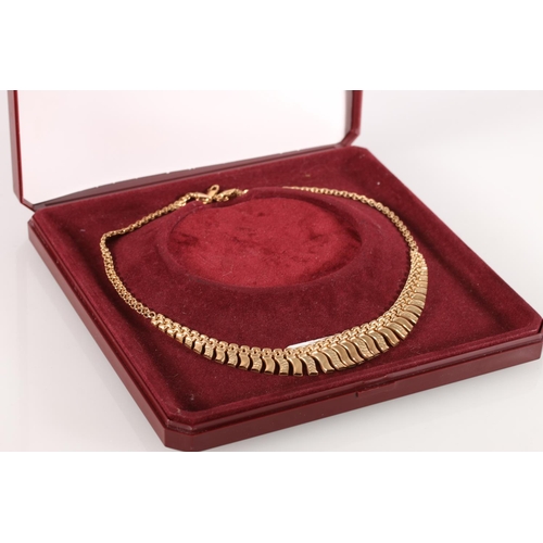 621 - 9ct gold necklace with graduated wavy panels, 44cm, 11.8g. 